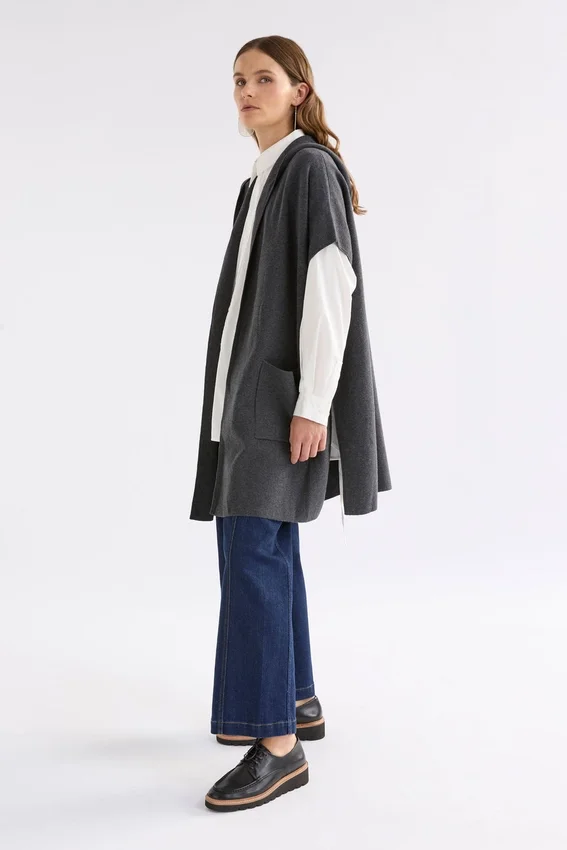 Neuwt poncho met capuchon Neuwt poncho met capuchon